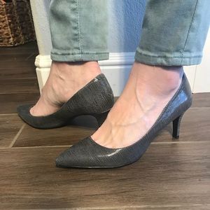 Nine wear grey heels
